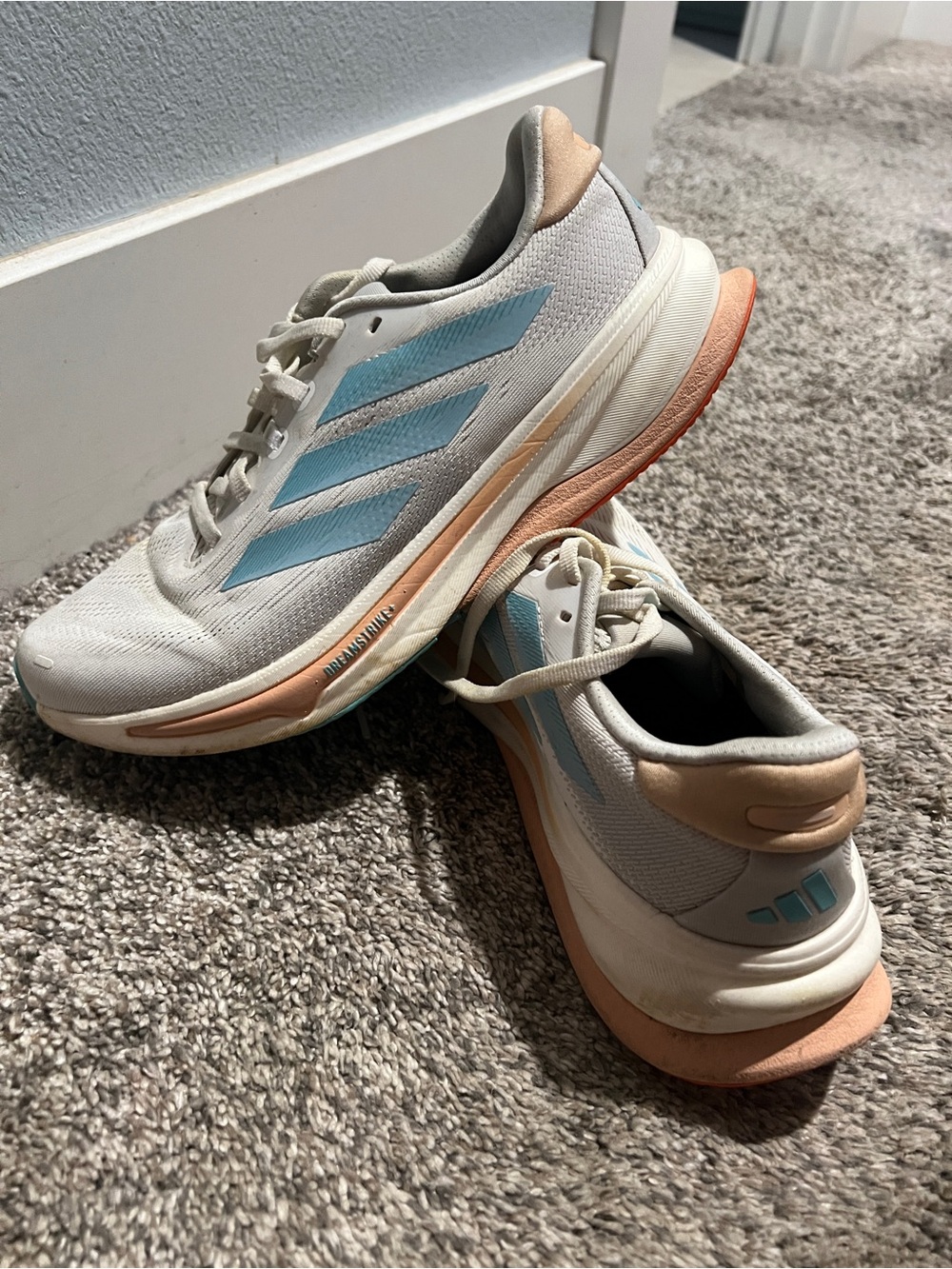 adidas Women’s White Sneakers with Light Blue Stripes and Peach Accents